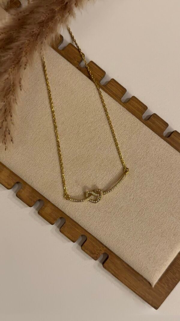 Knot heart necklace